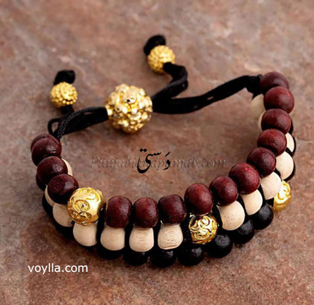 ,Paunhchi,ਪਹੁੰਚੀ,ਪੌਂਹਚੀ,ਦਸਤੀ,dasti,bracelets, band, pahunchi,Traditional Ornaments of Punjab,Jewellery,jewelry,زیور